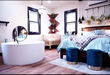 Spacious and modern birth suite designed with comfortable furnishings and a relaxing atmosphere for labor and delivery birth center Durham NC